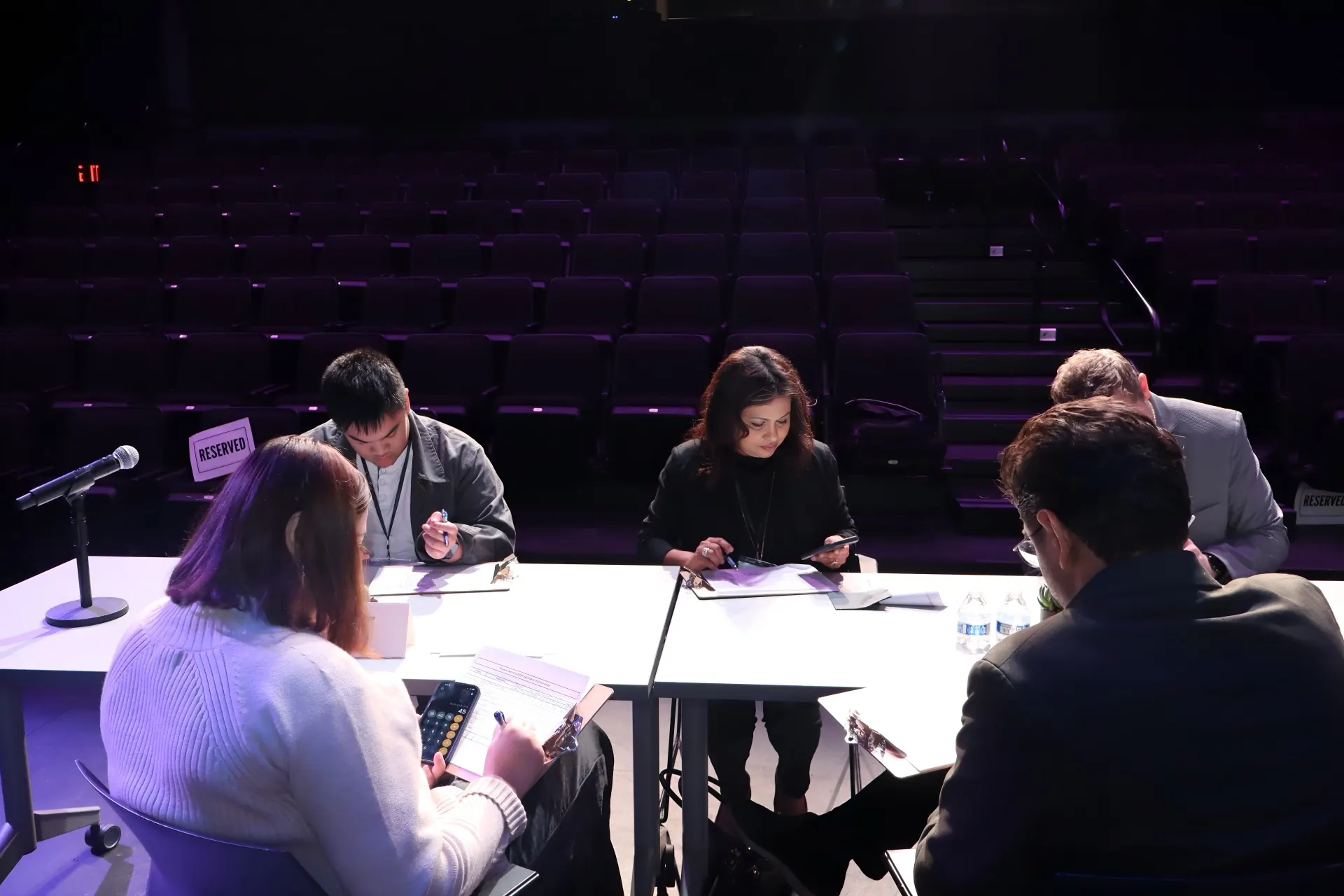Judges deliberating during the 2026 Final.