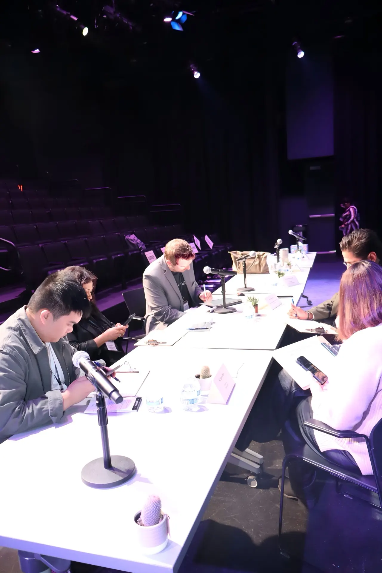 Wide view of the Virginia De Land Theater stage and judge table.